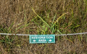 Restoration area area sign on a rope