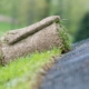 Close up view of hillside with a roll of sod