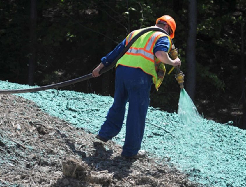 Varsity Worker Spraying Erosion Control Material 1030x644